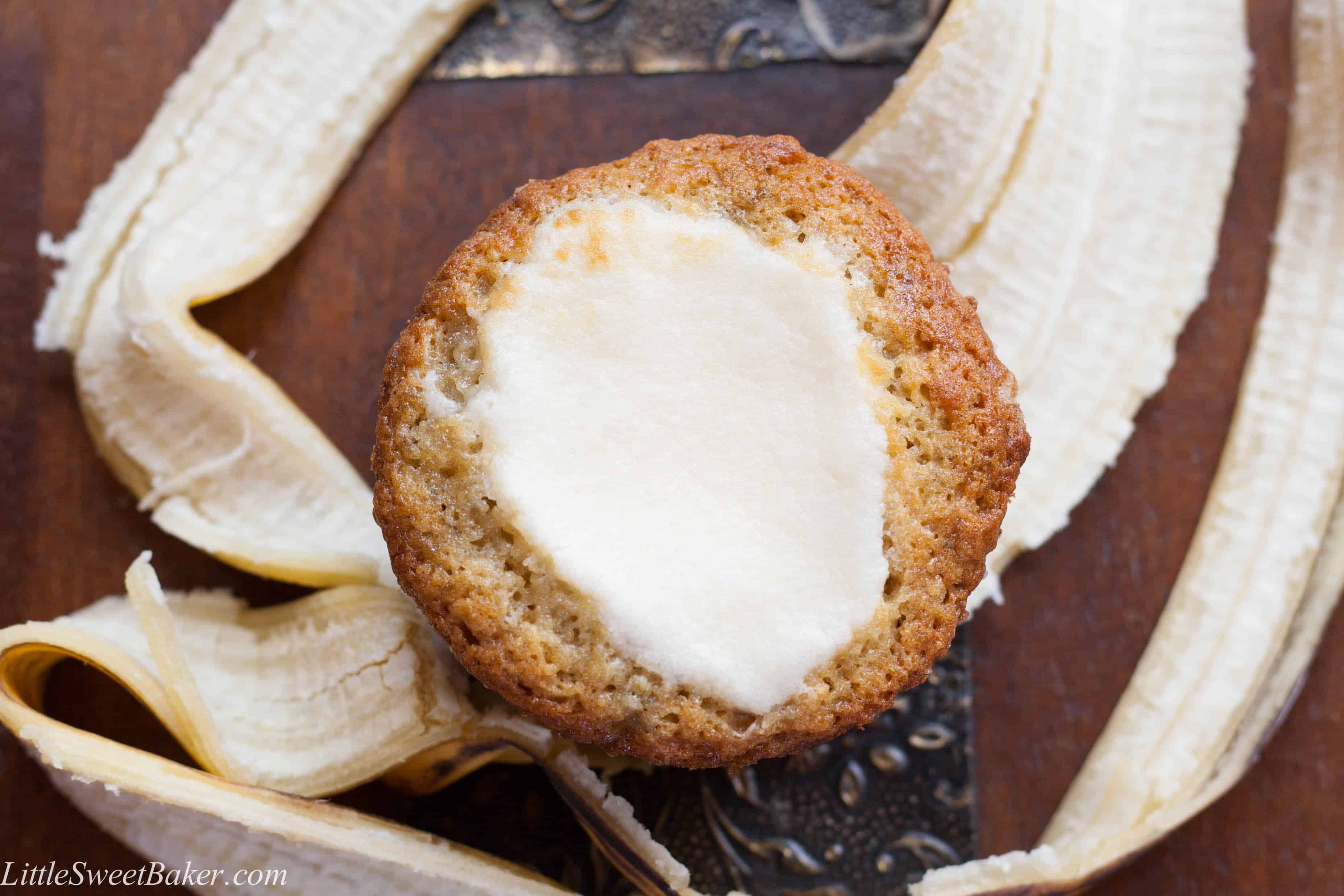 The Ultimate Best Banana Muffin. Light, fluffy and cake-like banana muffin with a cream cheese meringue baked on top. My favorite banana baked good.