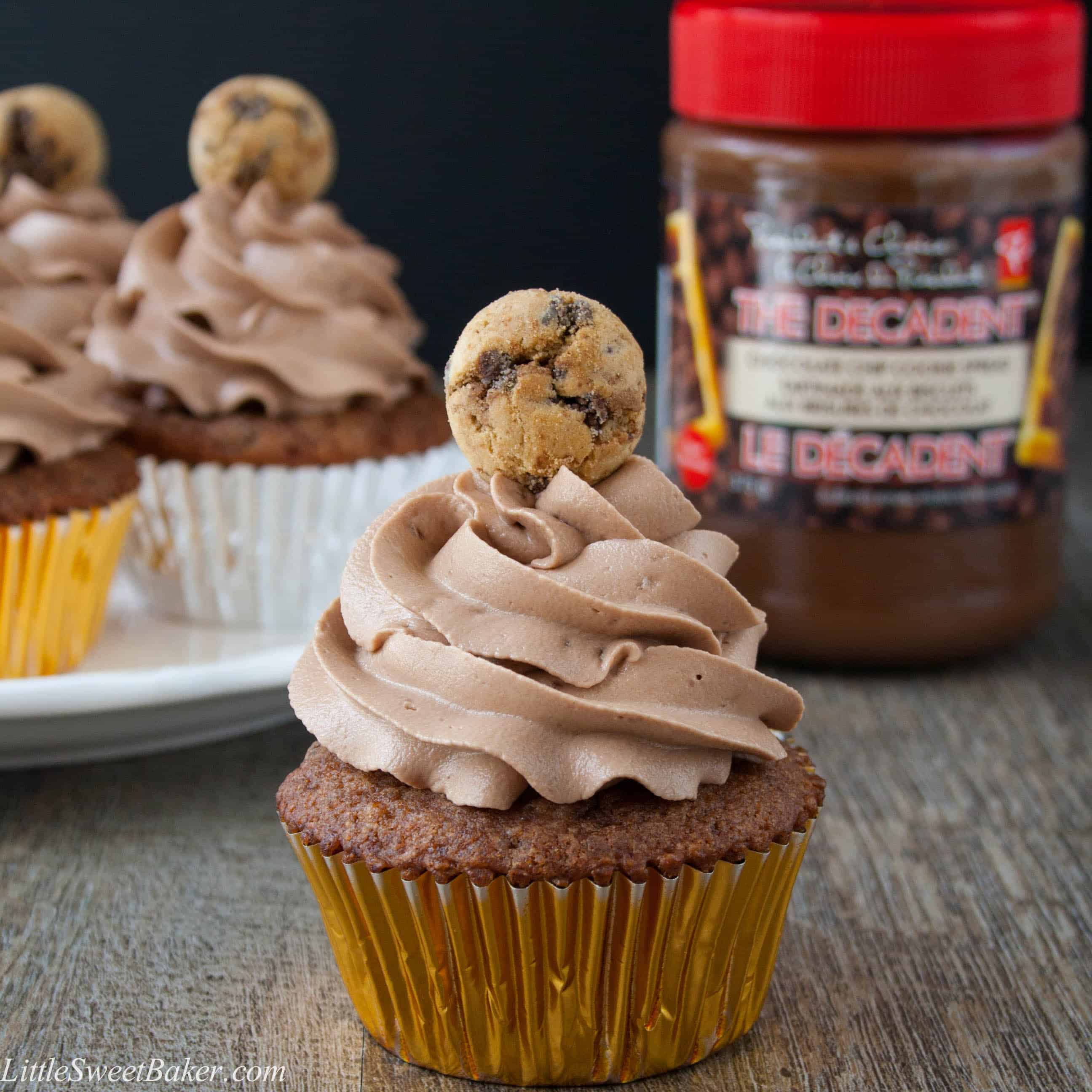 CHOCOLATE CHIP COOKIE CUPCAKES. A soft, moist and flavorful cookie butter cupcake topped with a chocolate cookie frosting. The ultimate chocolate chip cookie lover's dream!