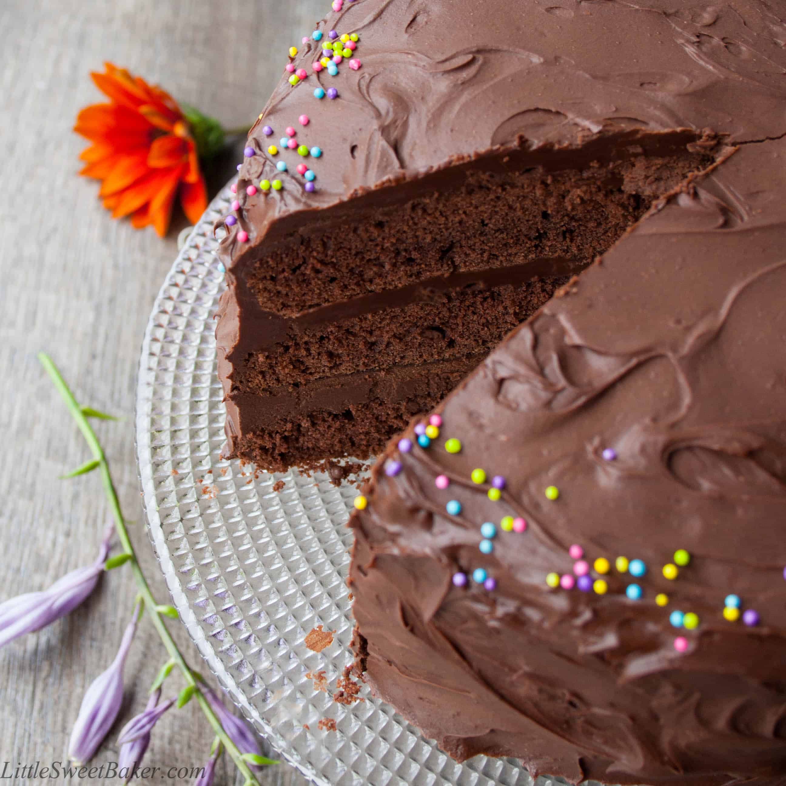 CHOCOLATE BIRTHDAY CAKE. A decadent 3-layer chocolate cake surrounded with the most luxurious rich chocolate frosting. Perfect for any occasion.