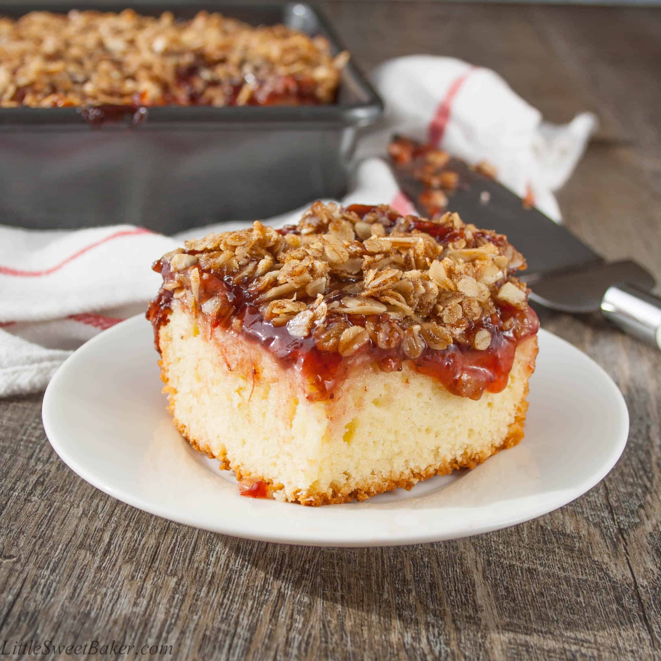 FRUIT TOPPED STREUSEL COFFEE CAKE. A delicious buttery coffee cake topped with sweet fruit pie filling and a crunchy cinnamon brown sugar almond & oat streusel.