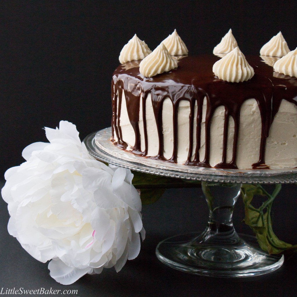 TRIPLE CHOCOLATE CAKE. A rich dark chocolate fudge cake surrounded with a creamy white chocolate buttercream and topped with a smooth chocolate ganache. This cake will have you saying "OMG!" It's that good.